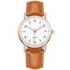 rose gold white face brown band