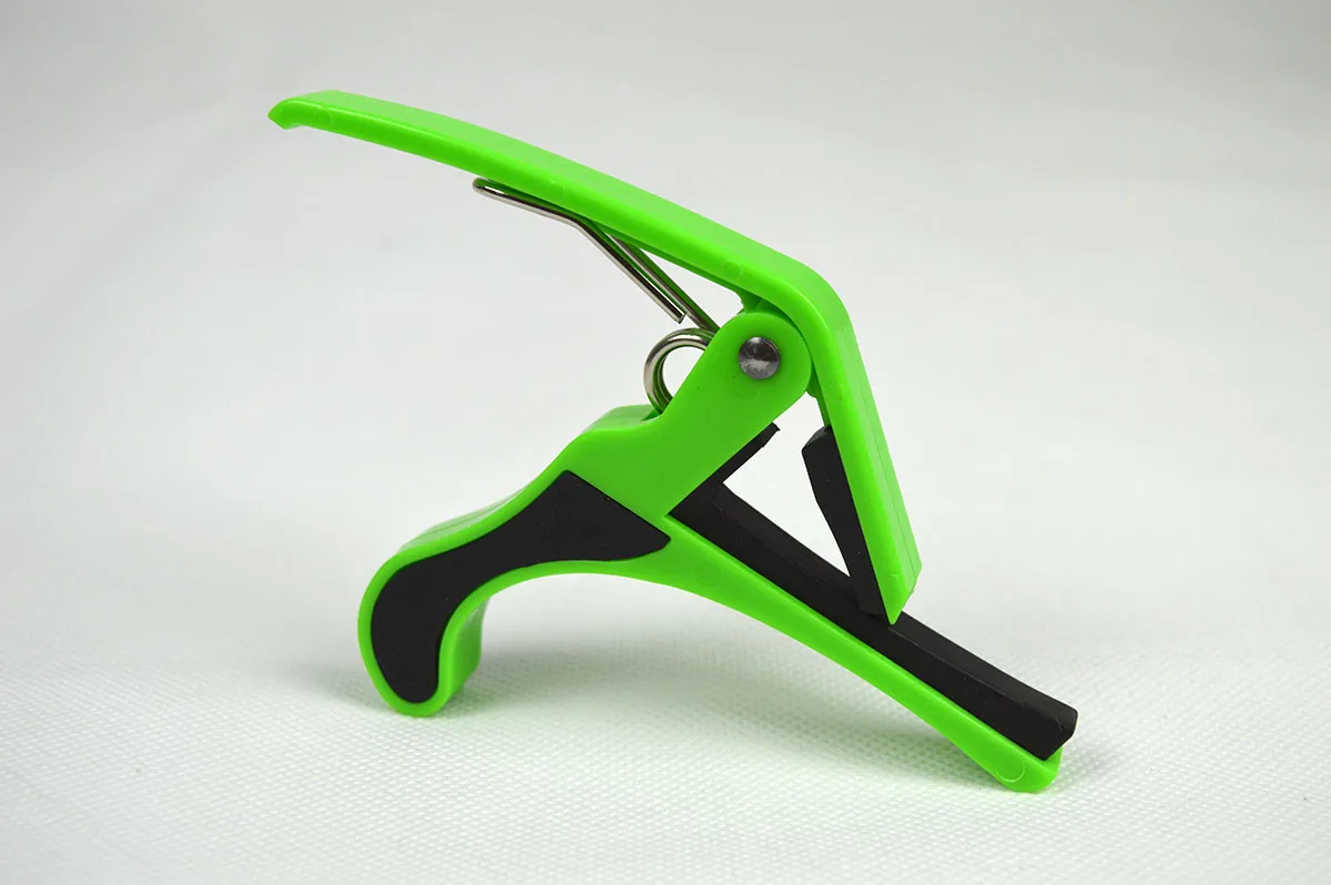 green guitar capo