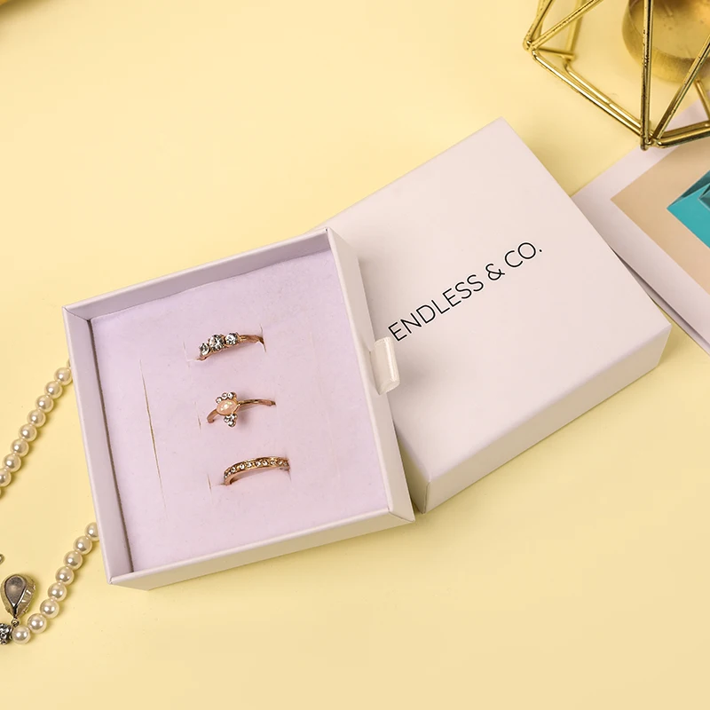 New Design Custom Logo Customized Recyclable Style Jewelry Packaging Box with Paper Material Emboss/Deboss Logo Custom Shape supplier