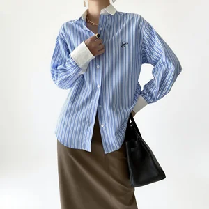 Custom Women's Blue and White Striped Shirt with Contrast Cuffs and Embroidered Detail