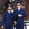 Navy blue (with white accents) suit