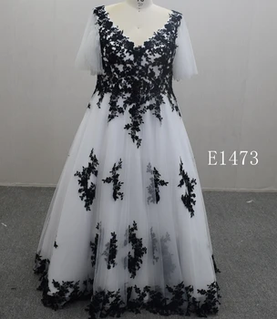 Short sleeve black and white back strap bridal dress