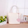 Bolso individual color hueso [de mano]