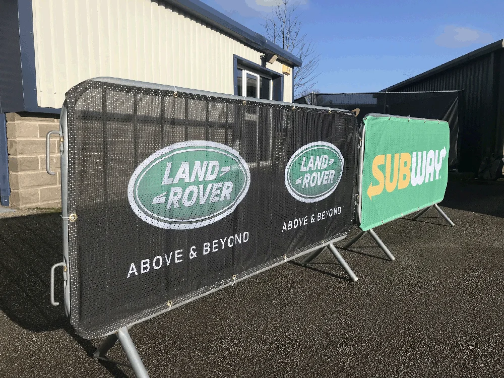 Outdoor Street Fence Barriers Are Covered With Custom Ssign Printing ...