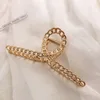 9 chain cross-kc gold