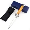 Orange shell handle white blade