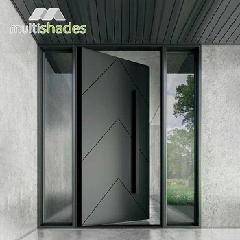 The luxurious aluminum pivot entrance door for modern houses, located at the exterior of the building.