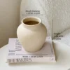 taglia piccola- --- Può contenere acqua