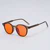 Olive green with orange lens