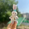 Reggicalze ape-dini appese per la bambola