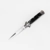 Black shell handle and white blade