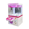 Mini machine à pince avec quatre faces entièrement transparentes.
