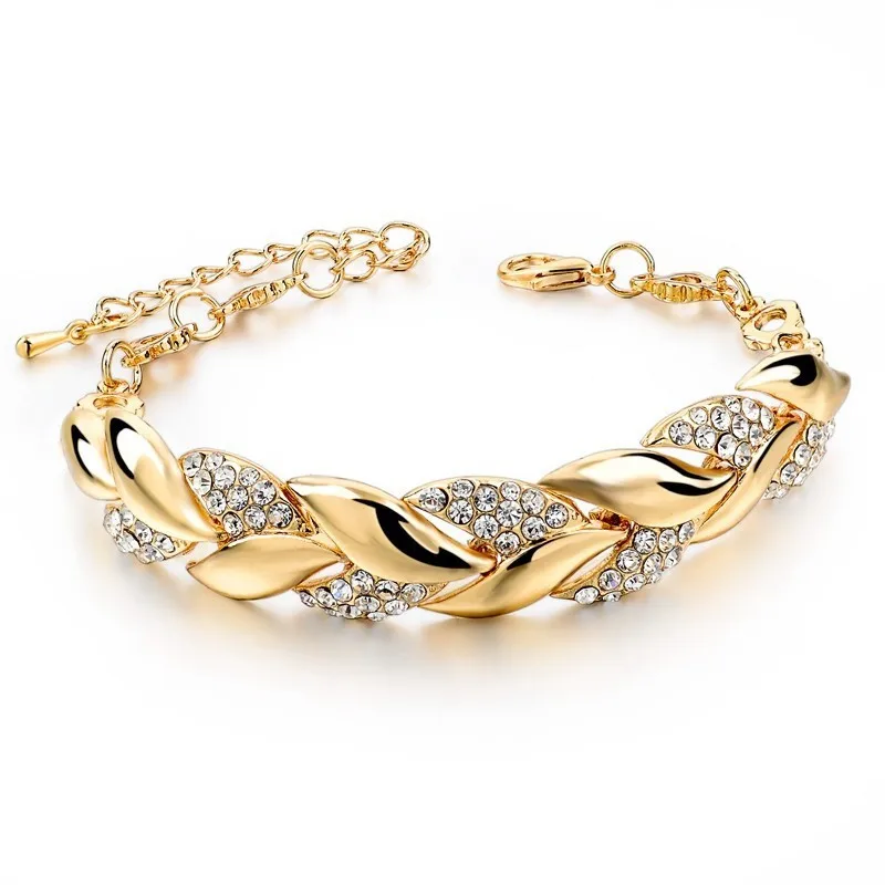 Золотые браслеты дизайнерские женские