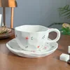 Green flowers-coffee cup and saucer