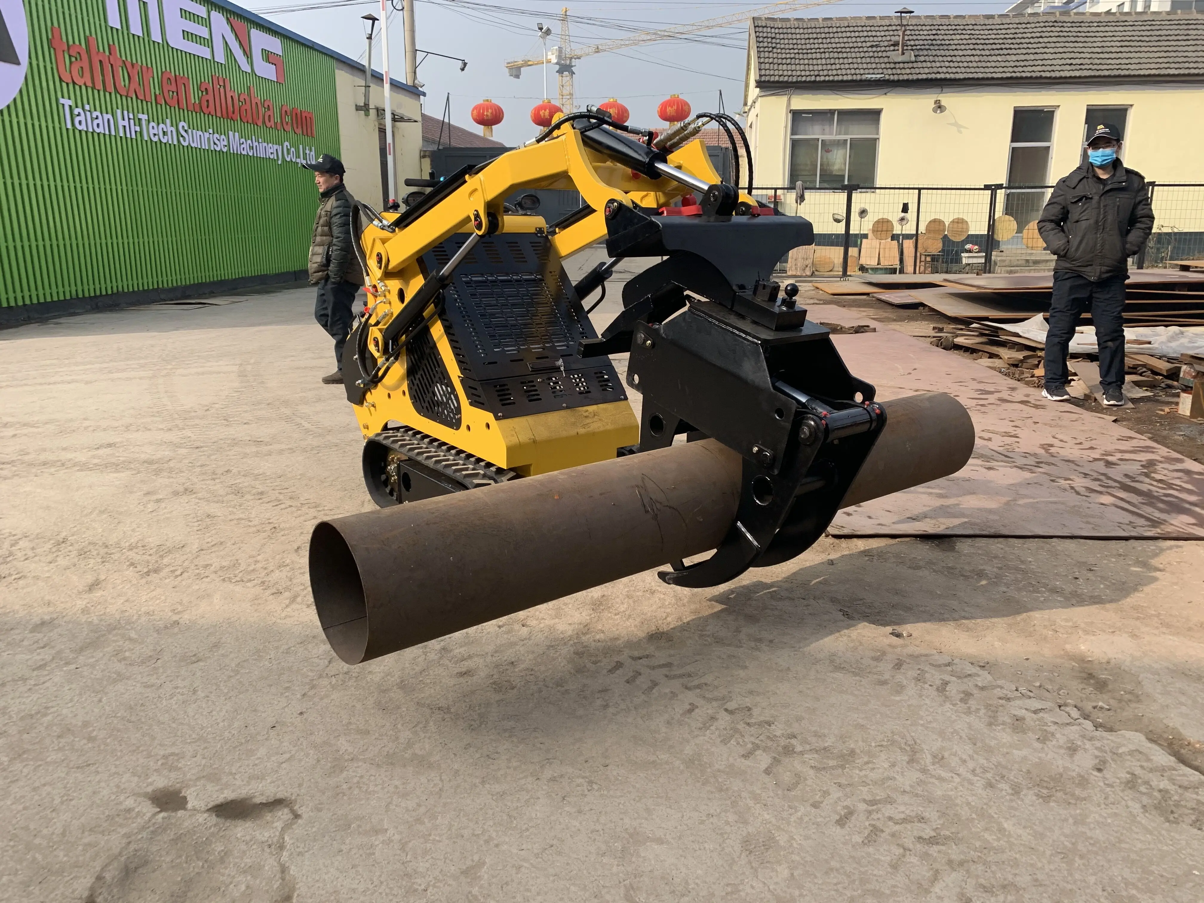 Log and Wood Loading and Unloading Rotating Positioned Log Grapple Skid Steer Loader