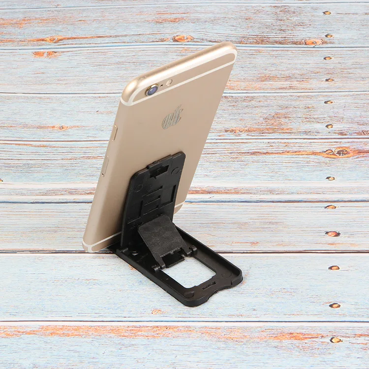 Foldable universal adjustable mobile phone holder