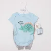 Abbigliamento per neonati a tema dinosauri