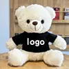 T-shirt bianca con orso nero