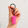 Ciondolo a forma di bollitore sportivo Drip - rosso rosa