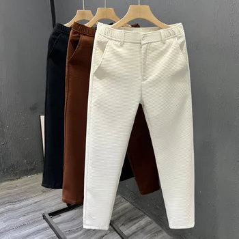 High-grade men's casual pants summer fashion slim straight trousers young Korean version of nine pants men's new style.