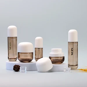 2026 New Arc Lid Combination Jar the Most Fashionable Design Amber Transparent Bottle White Matte Lid