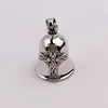 Pendentif simple croix cloche