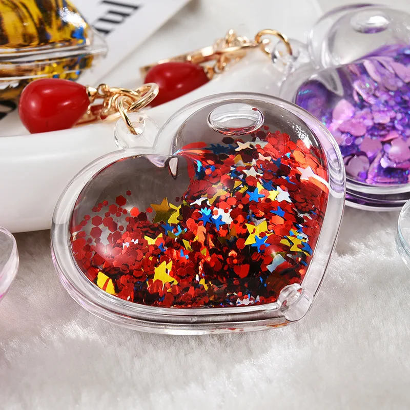 Hot sale heart shape double side transparent plastic keychain glitter fluid acrylic keychain for gifts manufacture