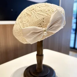 Women Trendy Bow Pearl Woven Beret Hat Summer Hollow Out Hat  display picture 2