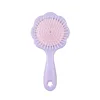 Purple flower cushion comb