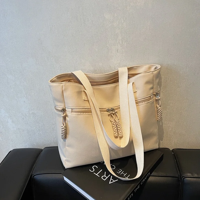 Simple Korean-style Solid Color Canvas Zipper Casual Stylish Large Capacity Winter 2026 Commuting Work Shoulder Stitching