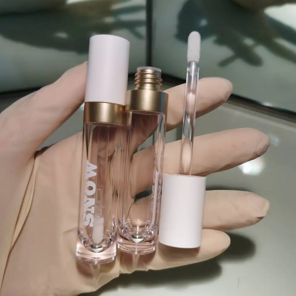 2021 new empty pink top cylinder luxury lipgloss tube packaging makeup tube lip gloss containers tube custom with logo wands