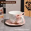 Pearlescent glaze pink bowknot cup and saucer set