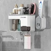 2 tazas con dispensador de pasta de dientes