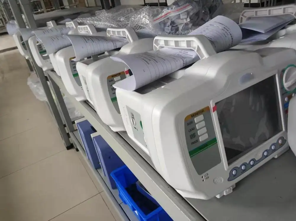 RC-DM7000  Aed 7000 Defibrillator Automated External Simulator Trainer with Spain Imported Defibrillator Monitor  Pad