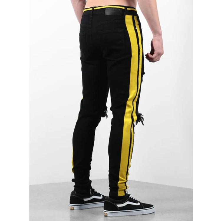 Black pants with yellow side outlet stripe