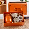 Orange-towel bear hand warmer