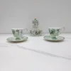1 teapot, 2 cups, 2 plates