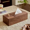 Caja de pañuelos integrada en madera de nogal.