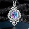 White gold powder blue pendant with Chopin chain