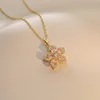 Collar de 33 circonitas con flor de Bauhinia rosa