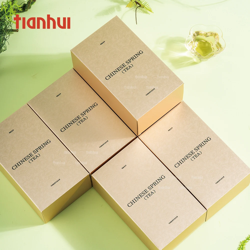 Caja de papel plegable pequeña y vacía Tianhui en color dorado, adecuada para el embalaje de té suelto