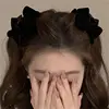 4 clips de agarre de lazo negro de gamuza