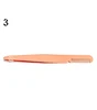 Rose gold eyebrow tweezers with comb
