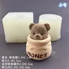 Piccolo barattolo di miele con testa di orso