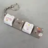 Semelle transparente à quatre boutons - modèle Piggy 919720
