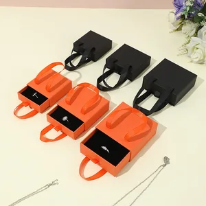 Custom Logo Christmas Gift Package Box with Handle Durable Cardboard Ribbon Kraft Paper Bag Drawer Sponge Liner Finger Ring Case