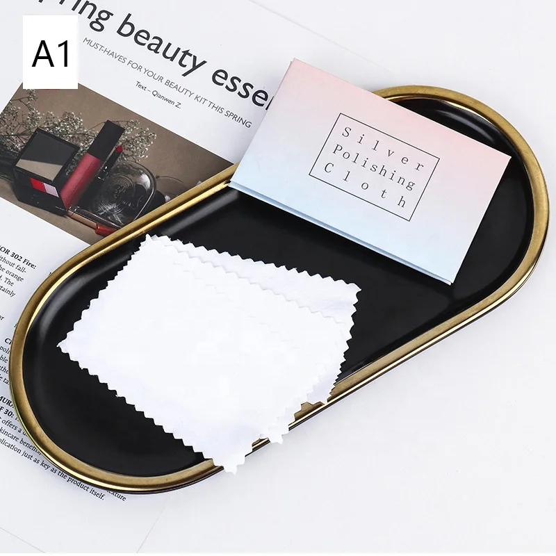 Microfiber cloth polishing sterling silver jewelry Sterling jewelry care cloth in use cleaning silver ring