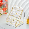 6 glass discs, transparent staircase pattern, gold support