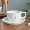 Small floral-coffee cup and saucer