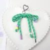 Love buckle green pendant